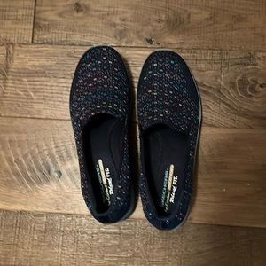 Skechers, size9. Cute and comfy.